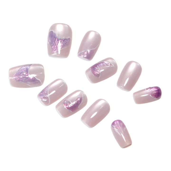 Artfully designed nail extensions with elegant flower motifs Bowlift