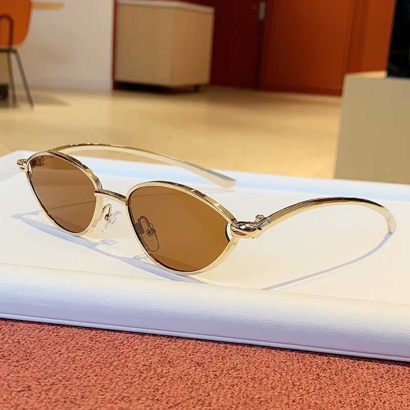 Women's designer sunglasses with elegant metal frame and protective lenses Bowlift