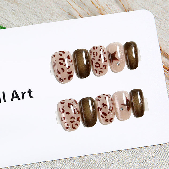 Artificial nails in modern animal print design Bowlift