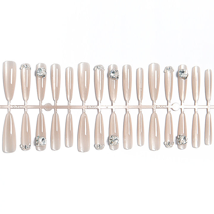 Acrylic nail set with glitter design and elegant 3D applications Bowlift