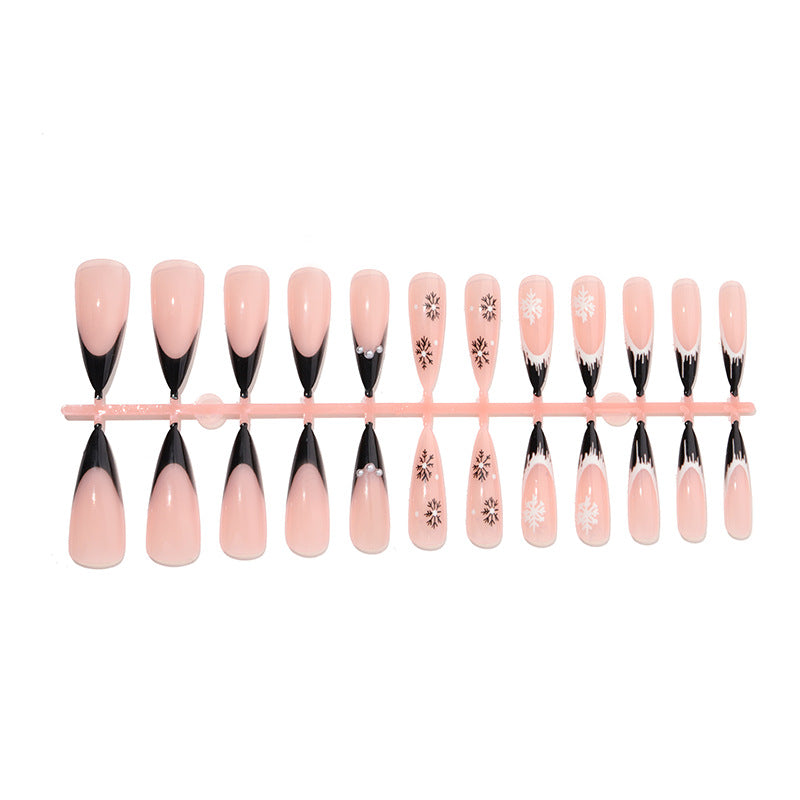 Artistic Stiletto Press-On Nail Set with Decorative Snowflake Designs Bowlift