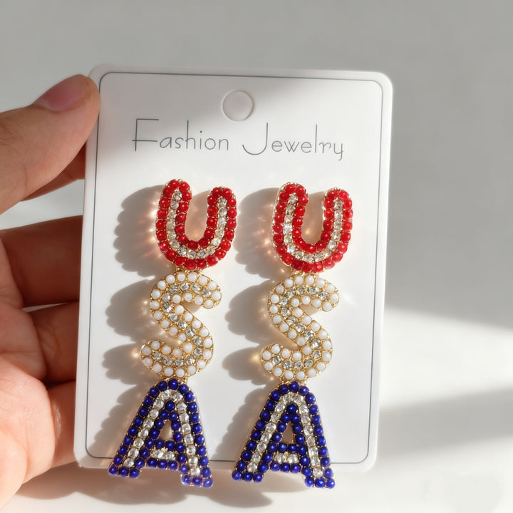 Women’s sparkling statement earrings with crystal beads and gold-plated setting Bowlift