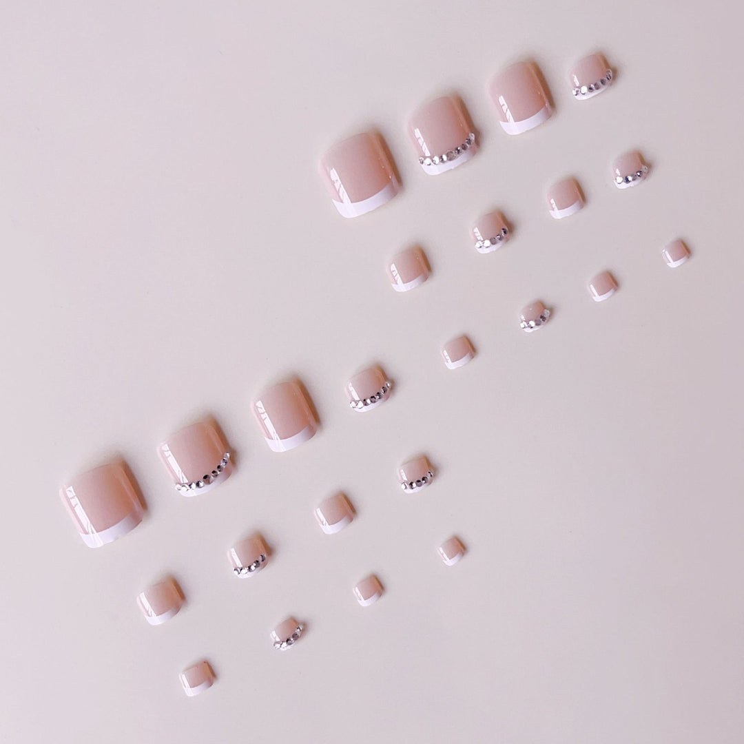 Nail art set with elegant French design and sparkling accents Bowlift