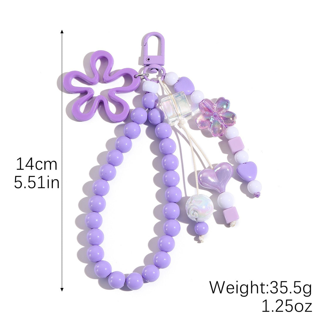Playful keychain with flower and butterfly details Bowlift