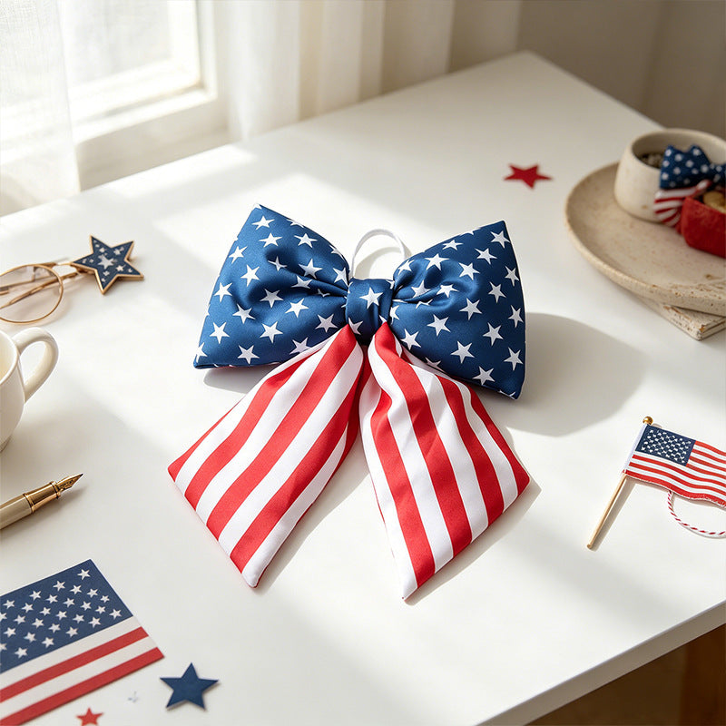 Women with large bow hair clip featuring patriotic star stripe motif Bowlift