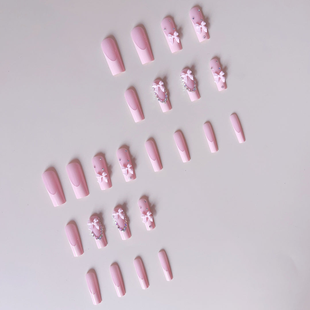 Nail art set with delicate arch decorations and rhinestone details Bowlift