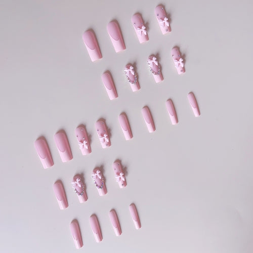 Nail art set with delicate arch decorations and rhinestone details Bowlift