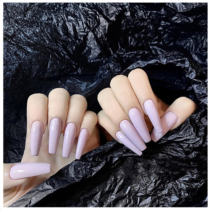 Acrylic nail set with elegant long tips and high gloss finish Bowlift