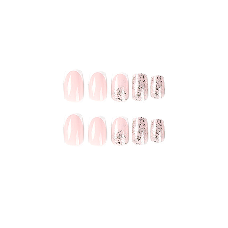 Artistic Nail Extensions with Glitter and French Tips Bowlift