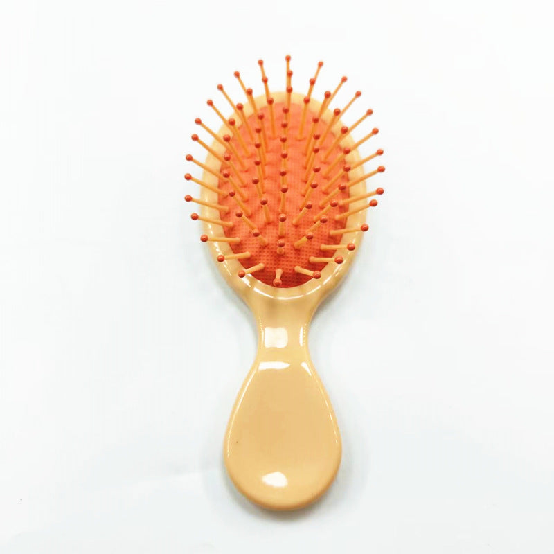 Hair comb with ergonomic handle Bowlift