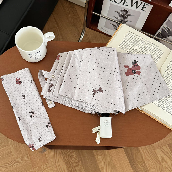 Ladies collapsible umbrella with playful design Bowlift