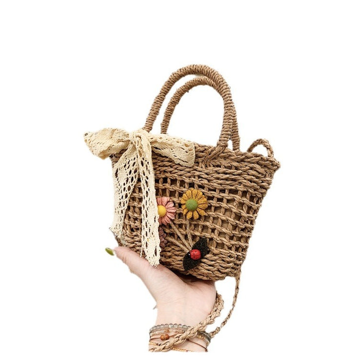 Playful basket bag with floral accents Bowlift