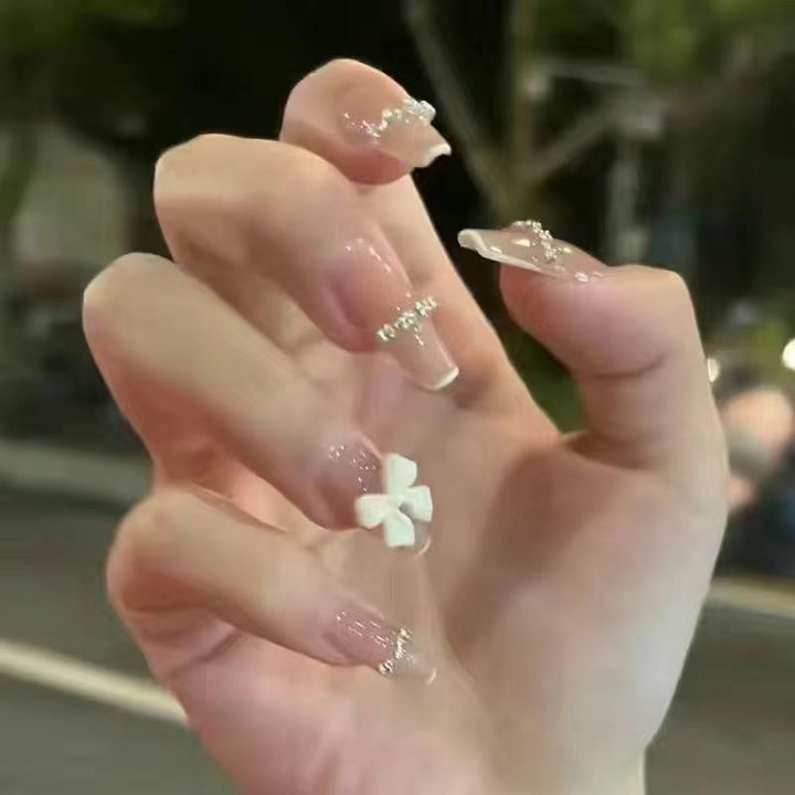 Artificial artificial nails with heart design and glitter elements Bowlift