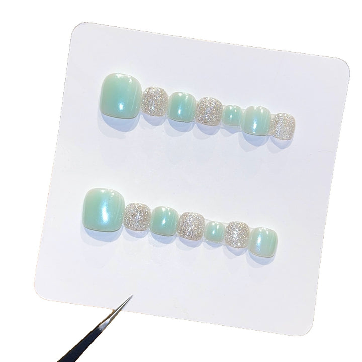 Acrylic nail set with glitter and pastel accent Bowlift