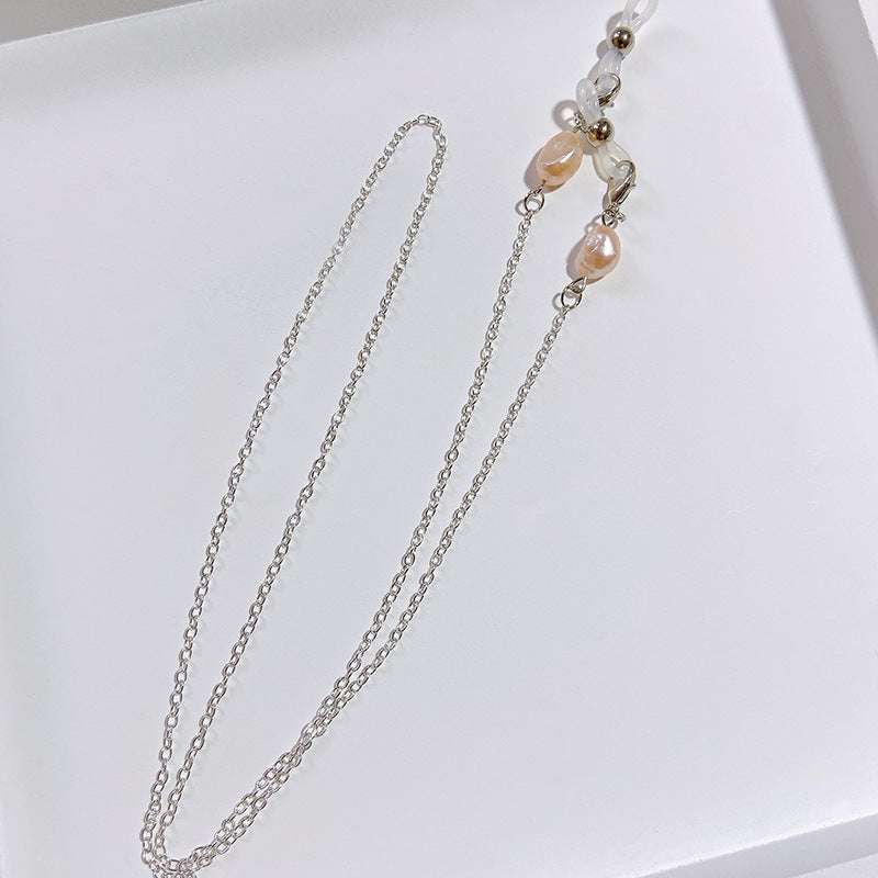 Elegant jewelry holder chain with pearl and gold accents Bowlift