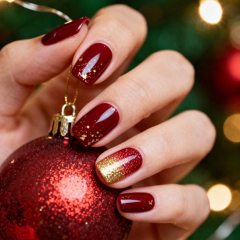 Elegant Press-On Nail Set with Glamorous Gold Glitter Accents Bowlift