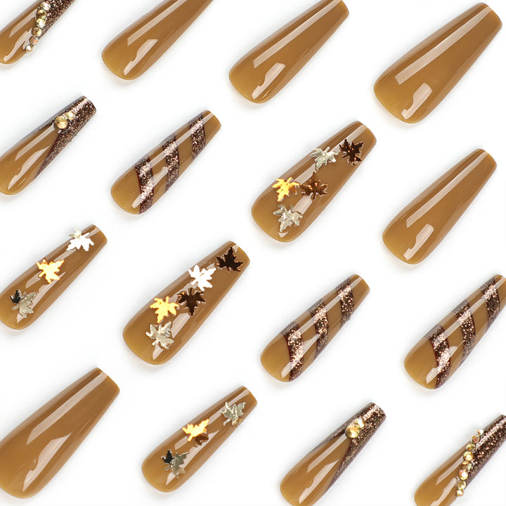 Artful Nail Art with Glitter and Leaf Design Bowlift