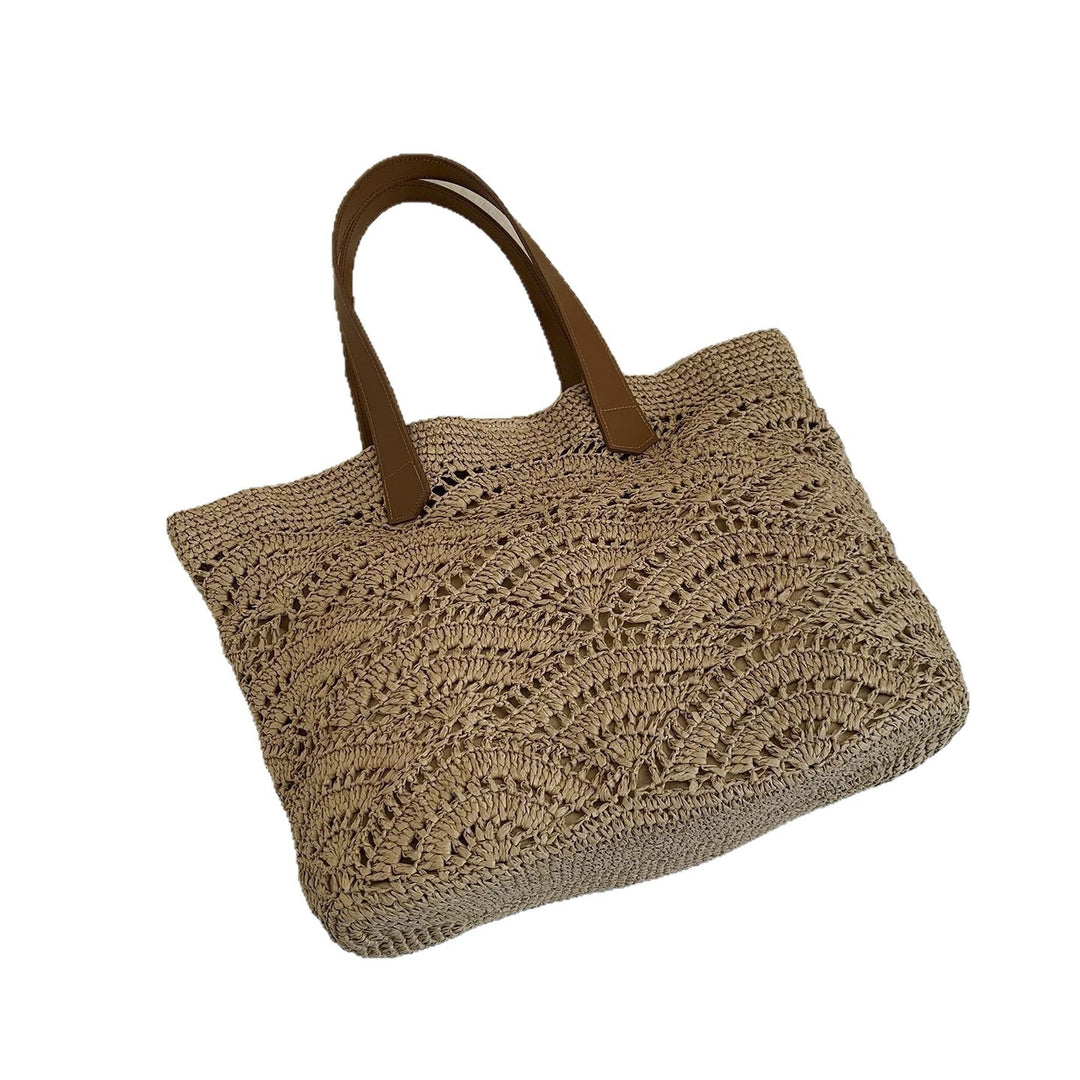 Handbag made of high-quality woven natural material with elegant leather handles Bowlift