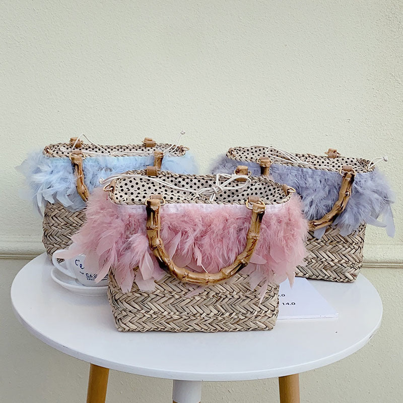 Elegant handbag with feathers and bamboo handles Bowlift