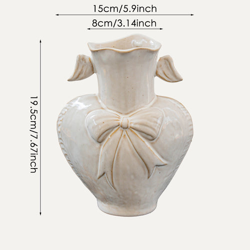 Decorative Heart-Shaped Ceramic Vase with Sculpted Bow and Wavy Neck