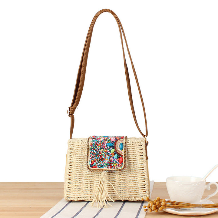 Fashionable straw shoulder bag with unique decor Bowlift
