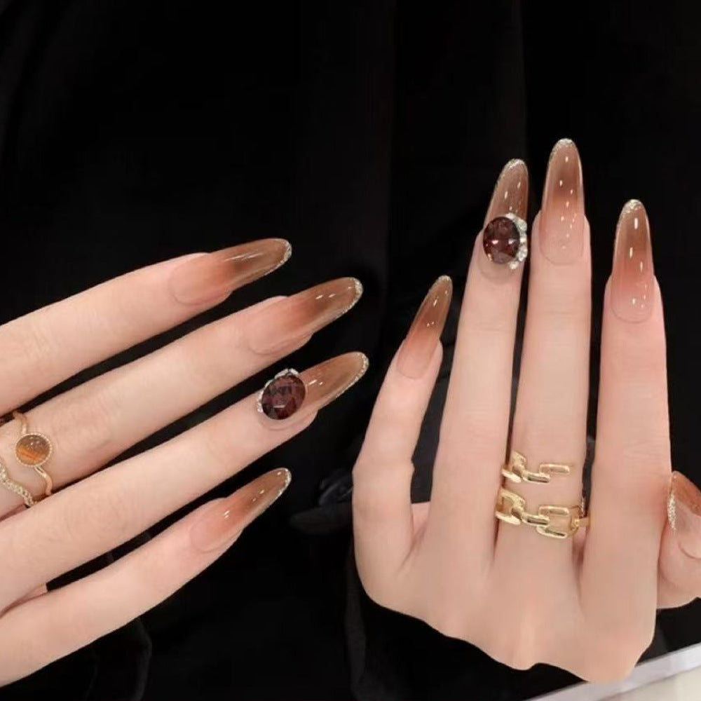 Glittering artificial nails with elegant tip design and crystal decoration Bowlift