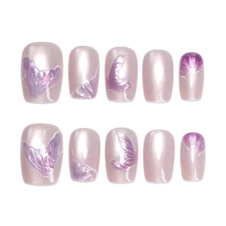 Artfully designed nail extensions with elegant flower motifs Bowlift