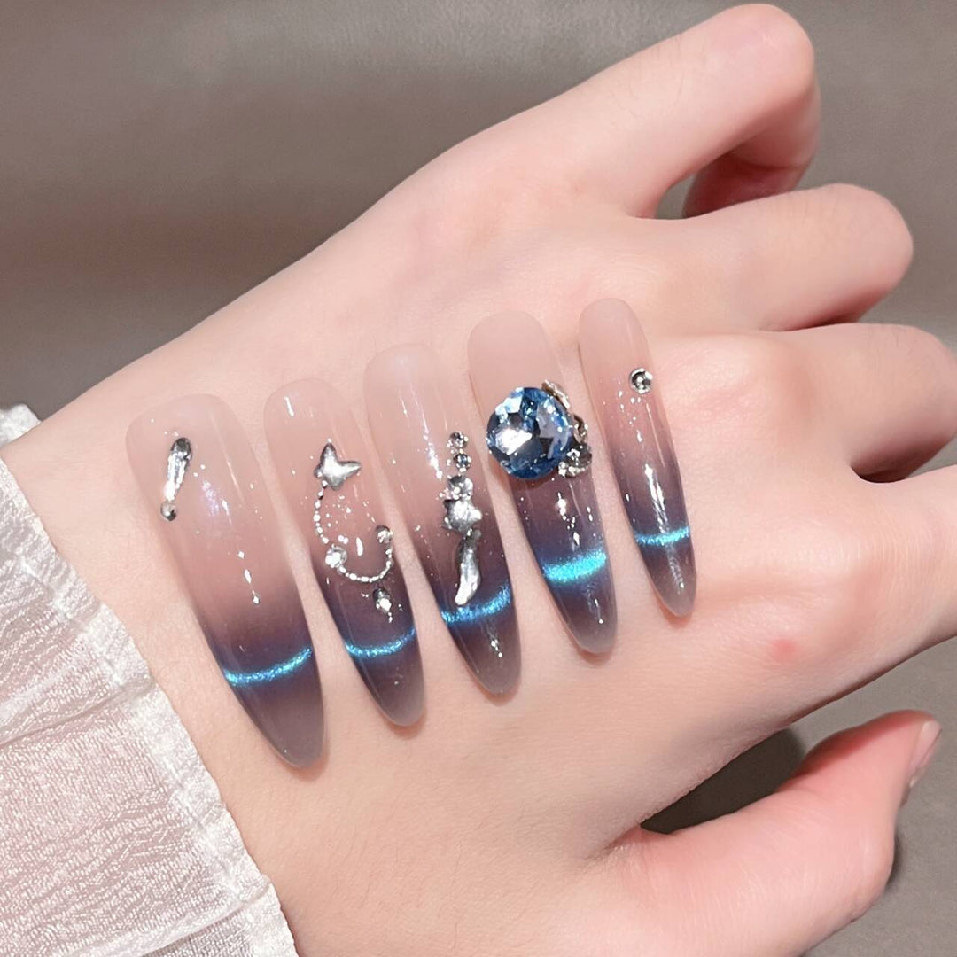 Artistic Stiletto Press-On Nail Art with Glimmering Accents Bowlift