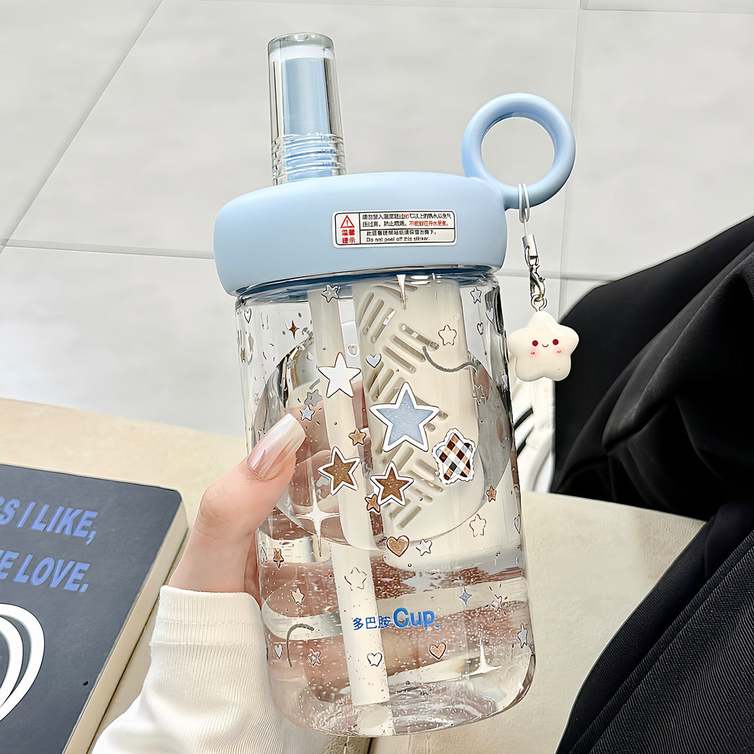 Women’s drinking bottle with integrated fruit filter and charming pendant Bowlift