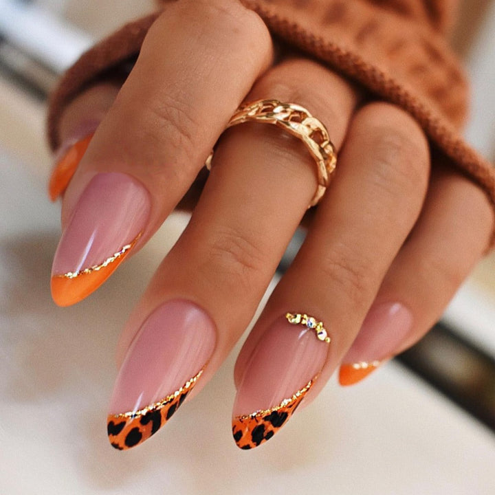 Creative nail art set with leopard pattern and glitter accents Bowlift