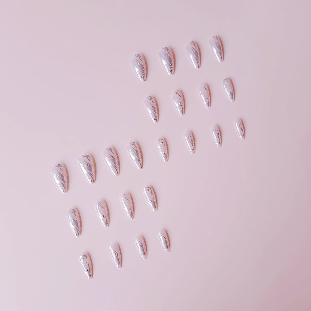 Nail set with elegant water drop design and 3D accents Bowlift