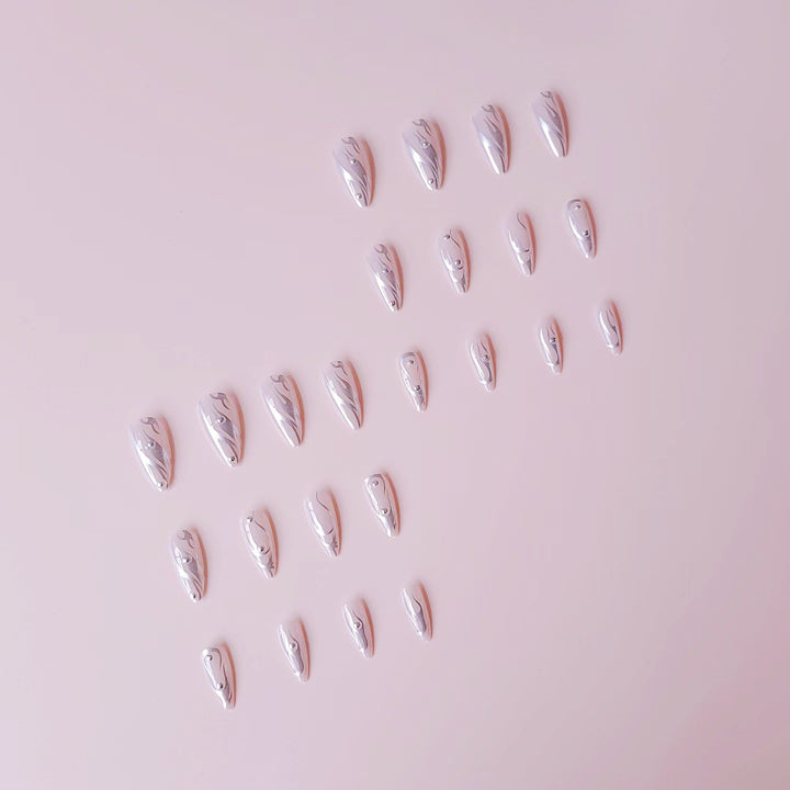 Nail set with elegant water drop design and 3D accents Bowlift