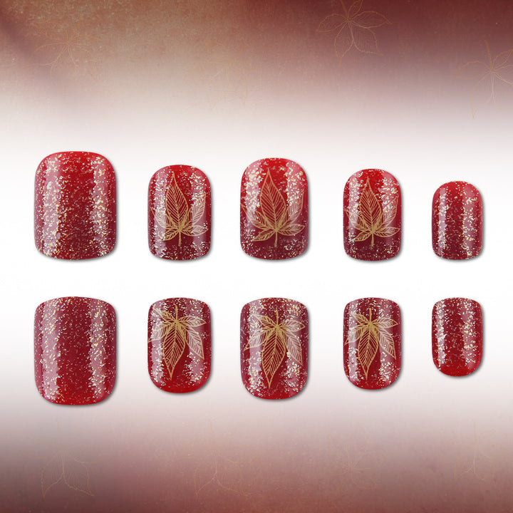 Artistic Leaf-Embellished Nail Art Design Bowlift