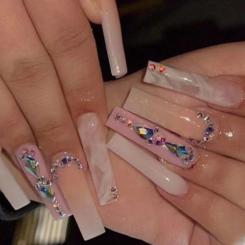 Glamorous artificial nails with gemstone embellishments Bowlift