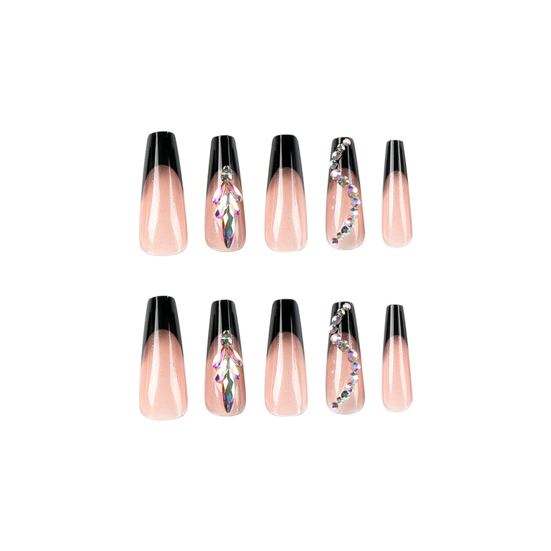 Artistic stiletto nails with glitter embellishments Bowlift