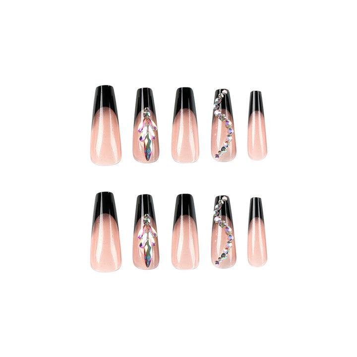 Artistic stiletto nails with glitter embellishments Bowlift