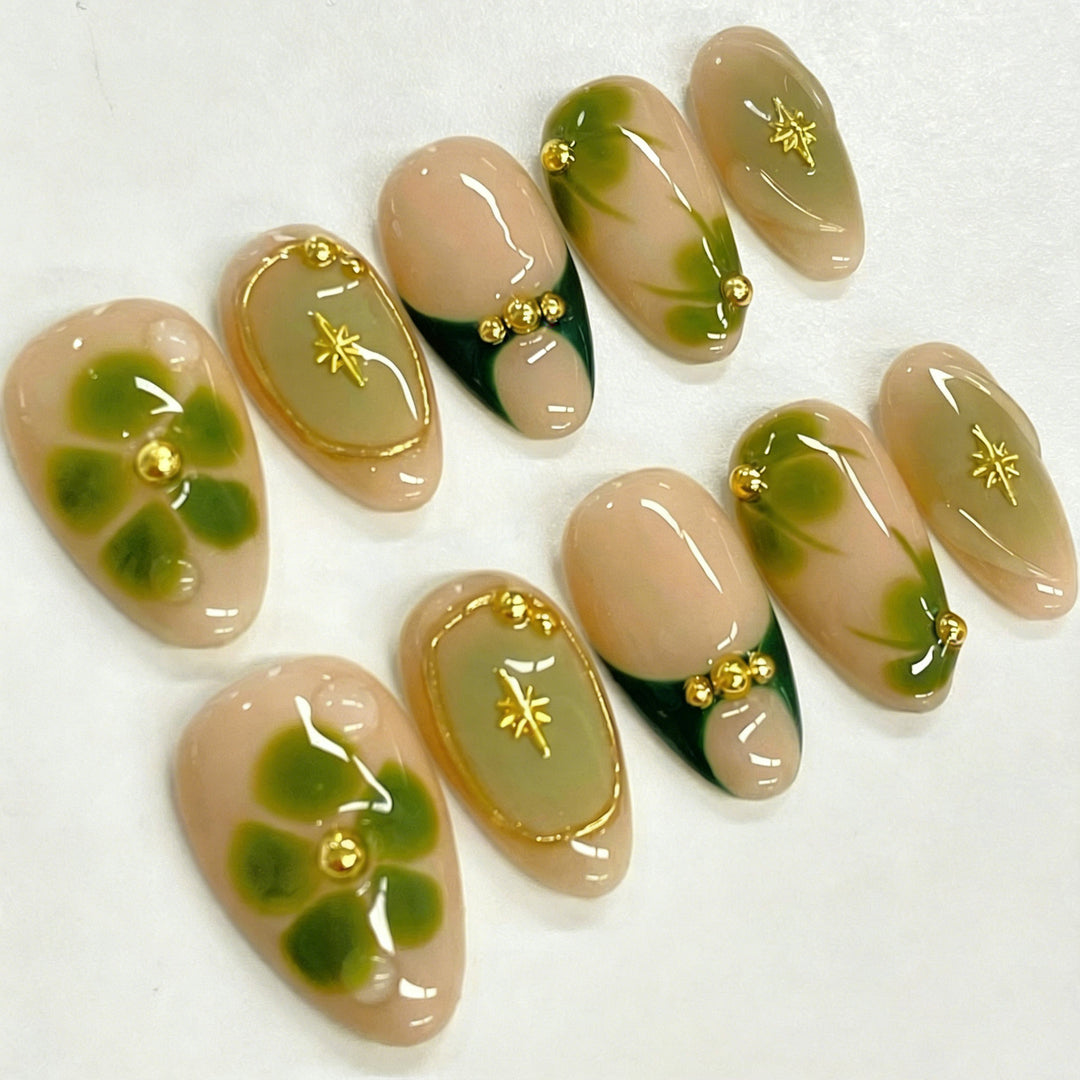 Artificial nail set with filigree floral accents Bowlift