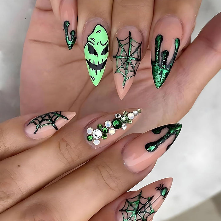 Acrylic nails with Halloween spider design and glitter accents Bowlift