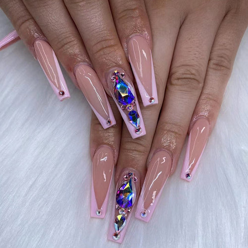 Artful nail extensions with rhinestone and flower accents Bowlift
