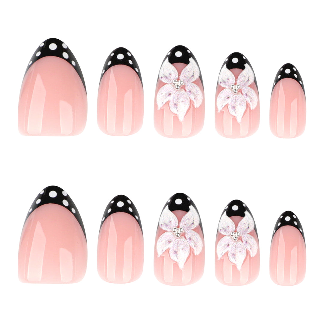 Artistic nail art with floral designs and elegant accents Bowlift