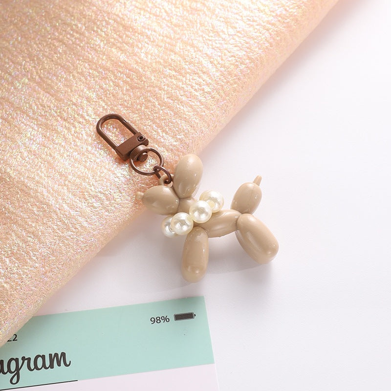 Playful keychain with balloon dog and beads Bowlift