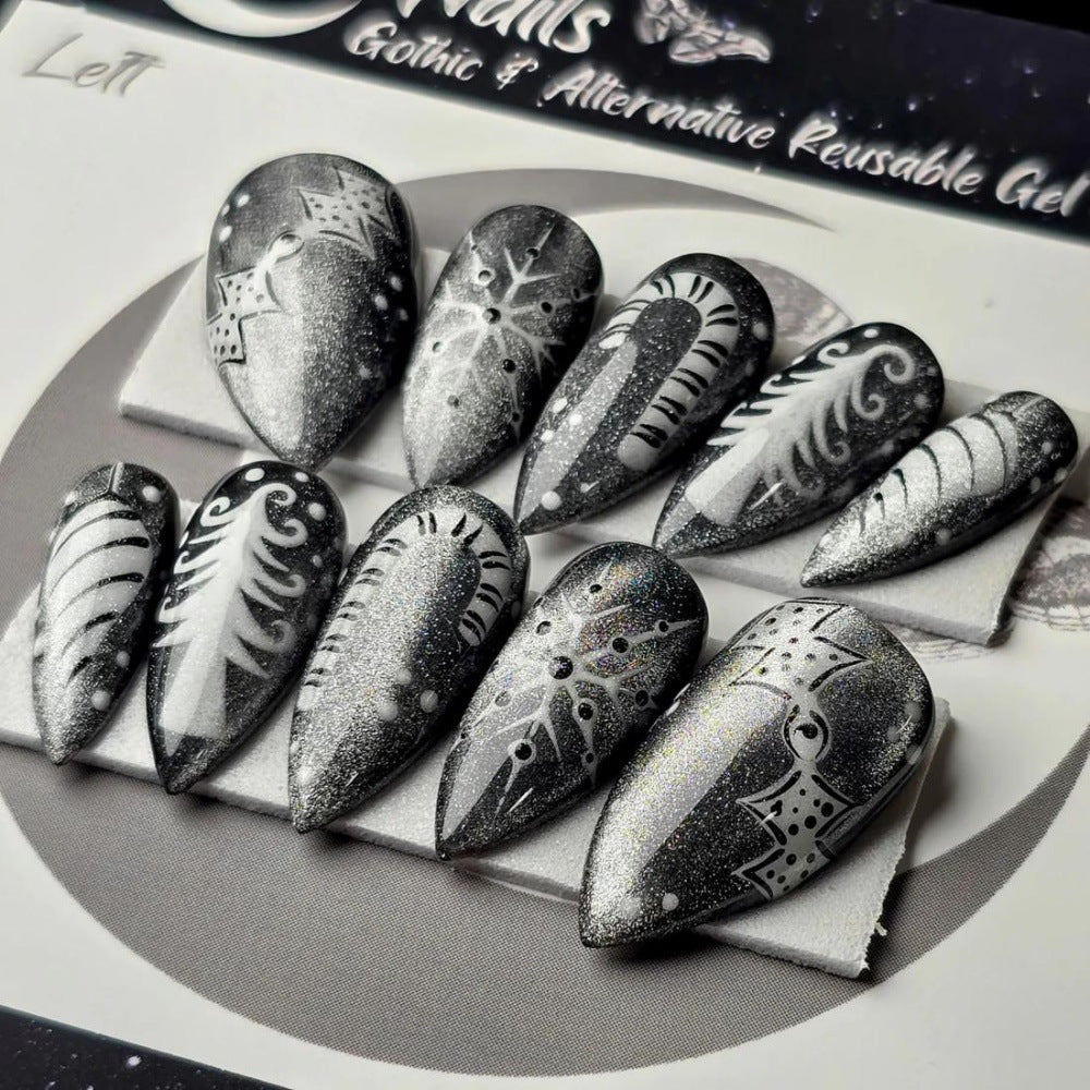 Creative Nail Art in Glamorous Black-White Design Bowlift