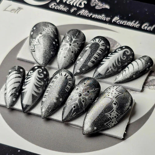 Creative Nail Art in Glamorous Black-White Design Bowlift