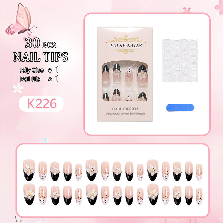 Artful nail tips with floral embellishments Bowlift