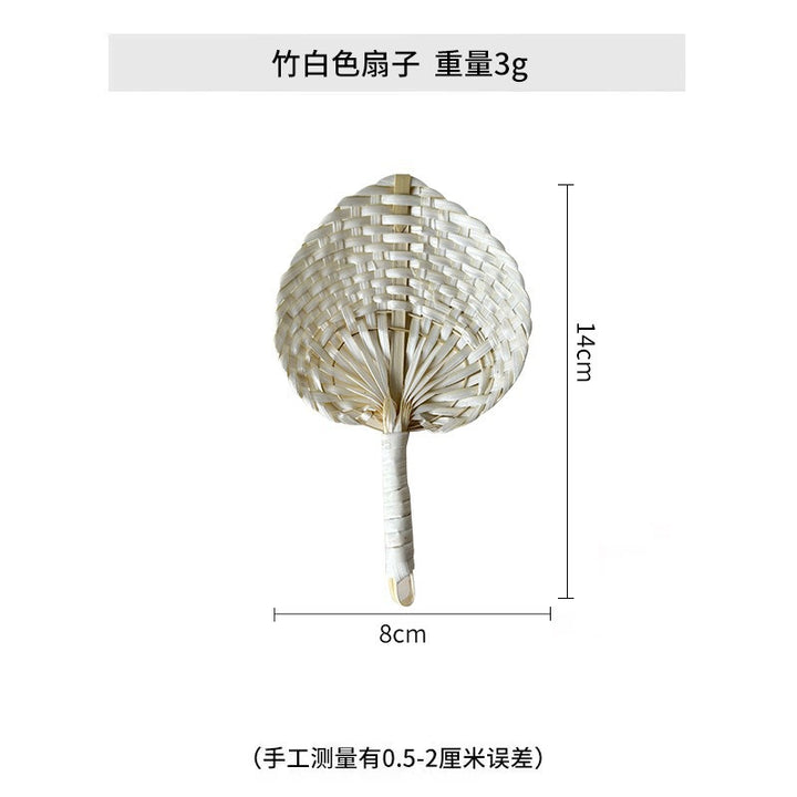 Women handmade fan made of natural material Bowlift