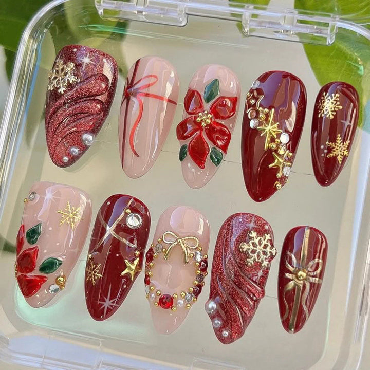 Artificial nail set in festive winter design with glamorous accents Bowlift