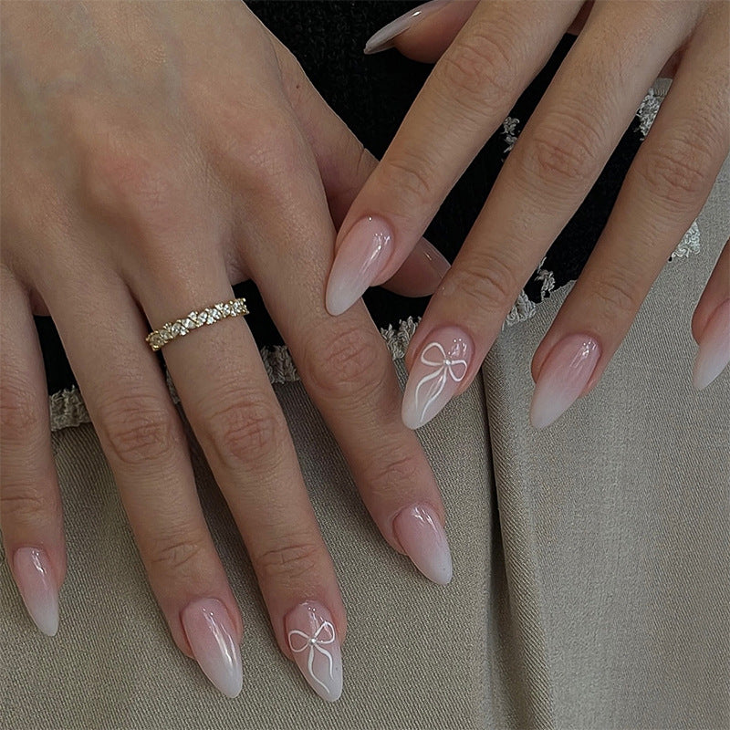 Elegant Press-On Nail Set with Delicate Floral Accents Bowlift