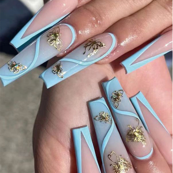 Artificial nail extensions in an elegant style with floral design Bowlift