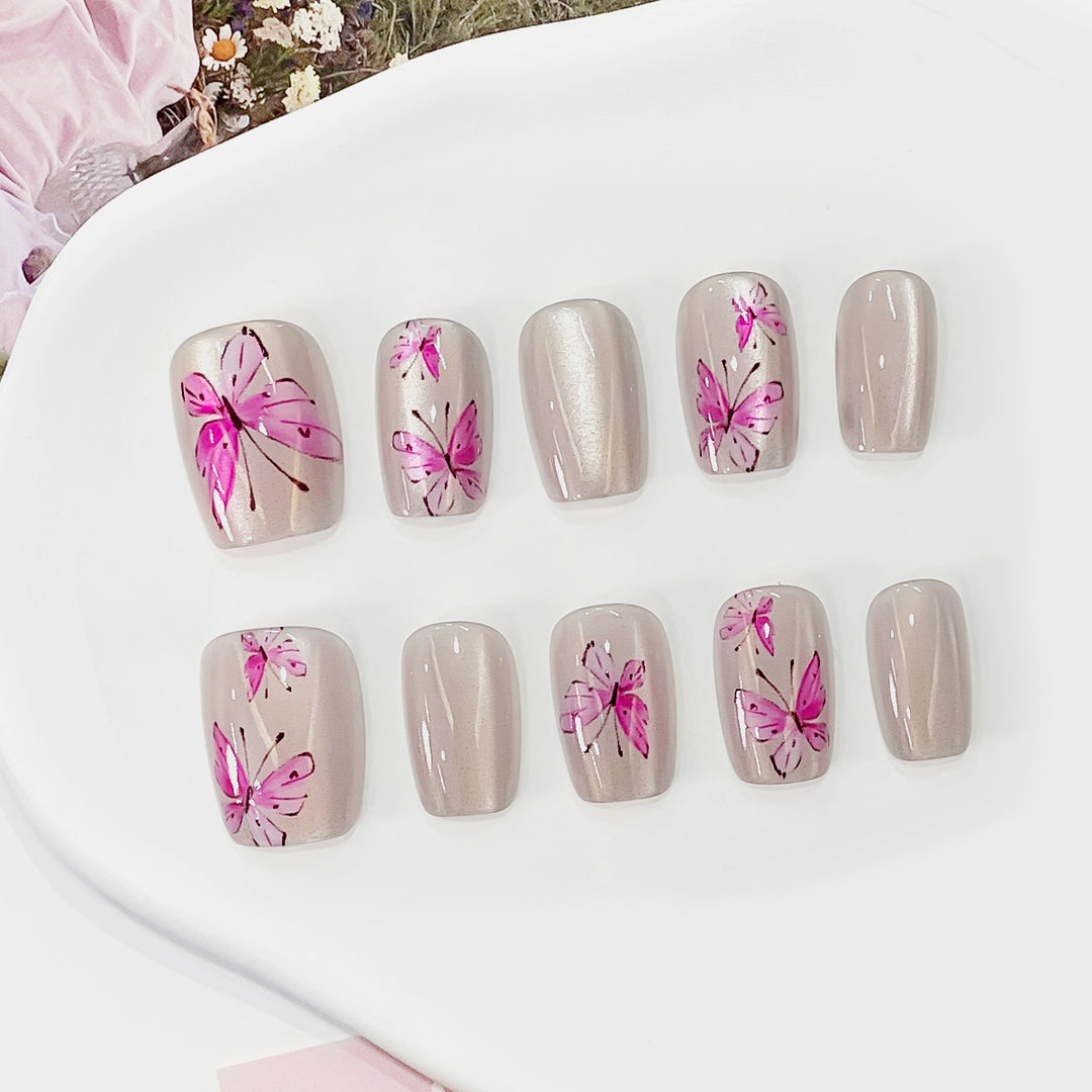 Artistic and elegant artificial nails with butterflies Bowlift