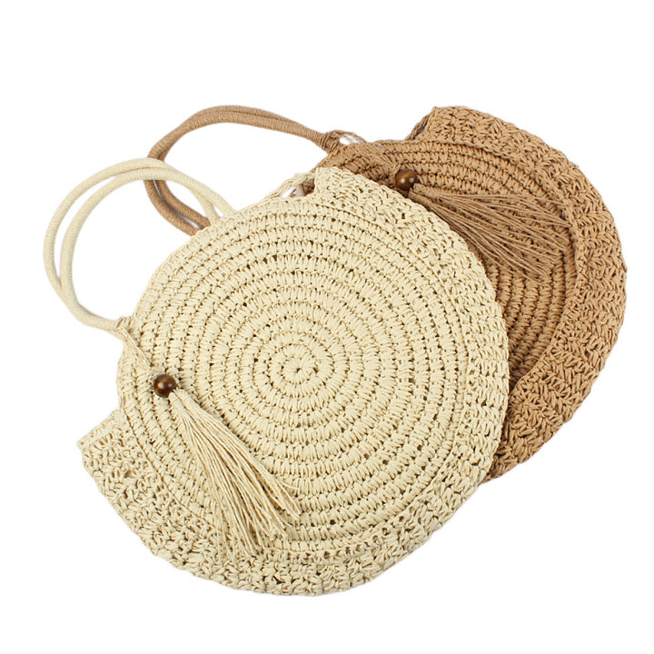 Round basket bag with elegant tassel Bowlift